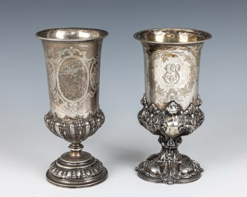 A GROUP OF TWO SILVER KIDDUSH CUPS. Germany and Austria, c. 1900. Each engraved with engine turned