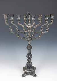 A SILVER HANUKKAH MENORAH. Of traditional form. 20?? tall.