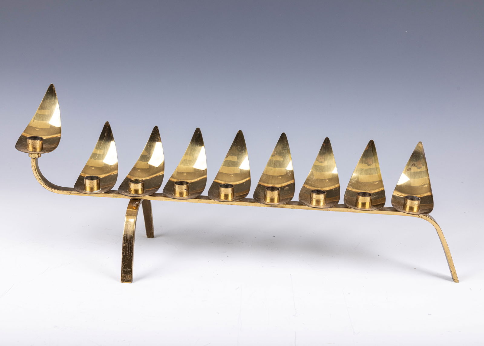 38. A LARGE BRASS MENORAH BY LUDWIG WOLPERT. Jerusalem, Israel c. 1950. An early example was crafted (1 of 2)