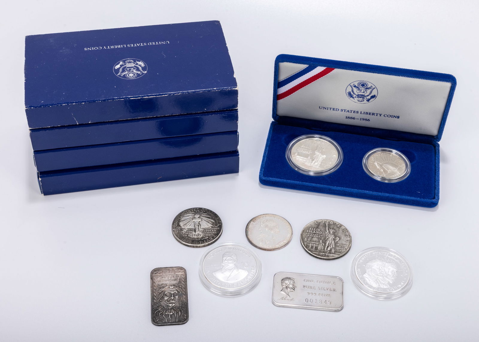 A COLLECTION OF  FIVE 1986 LIBERTY COIN PROOF SETS AND OTHER AMERICAN COINS. Also included are (1 of 5)