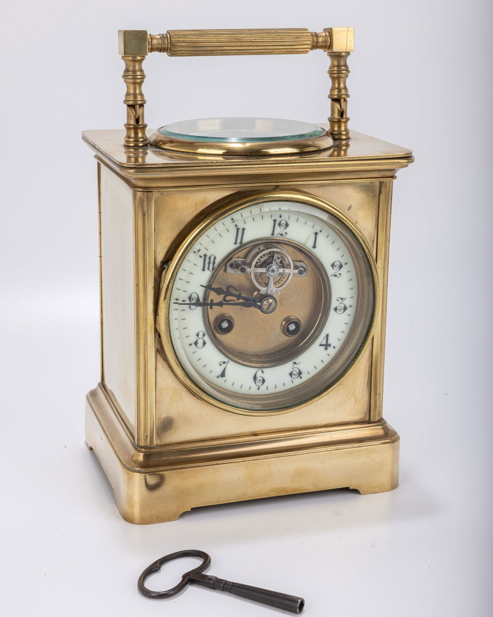 A FRENCH TIME AND WEATHER COMPENDIUM CARRIAGE CLOCK. France, c. 1890. The face with a porcelain (1 of 4)