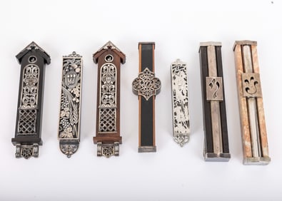 A COLLECTION OF SEVEN MEZUZAH COVERS BY LUVATON