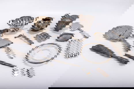 A GROUP OF STERLING SILVER TABLEWARE AND GROOMING ITEMS. Including a Sterling Razor, brushes, two: A GROUP OF STERLING SILVER TABLEWARE AND GROOMING ITEMS. Including a Sterling Razor, brushes, two George Jensen cheese shavers, a sugar bowl, a glass bottle with silver latticework and other objects.