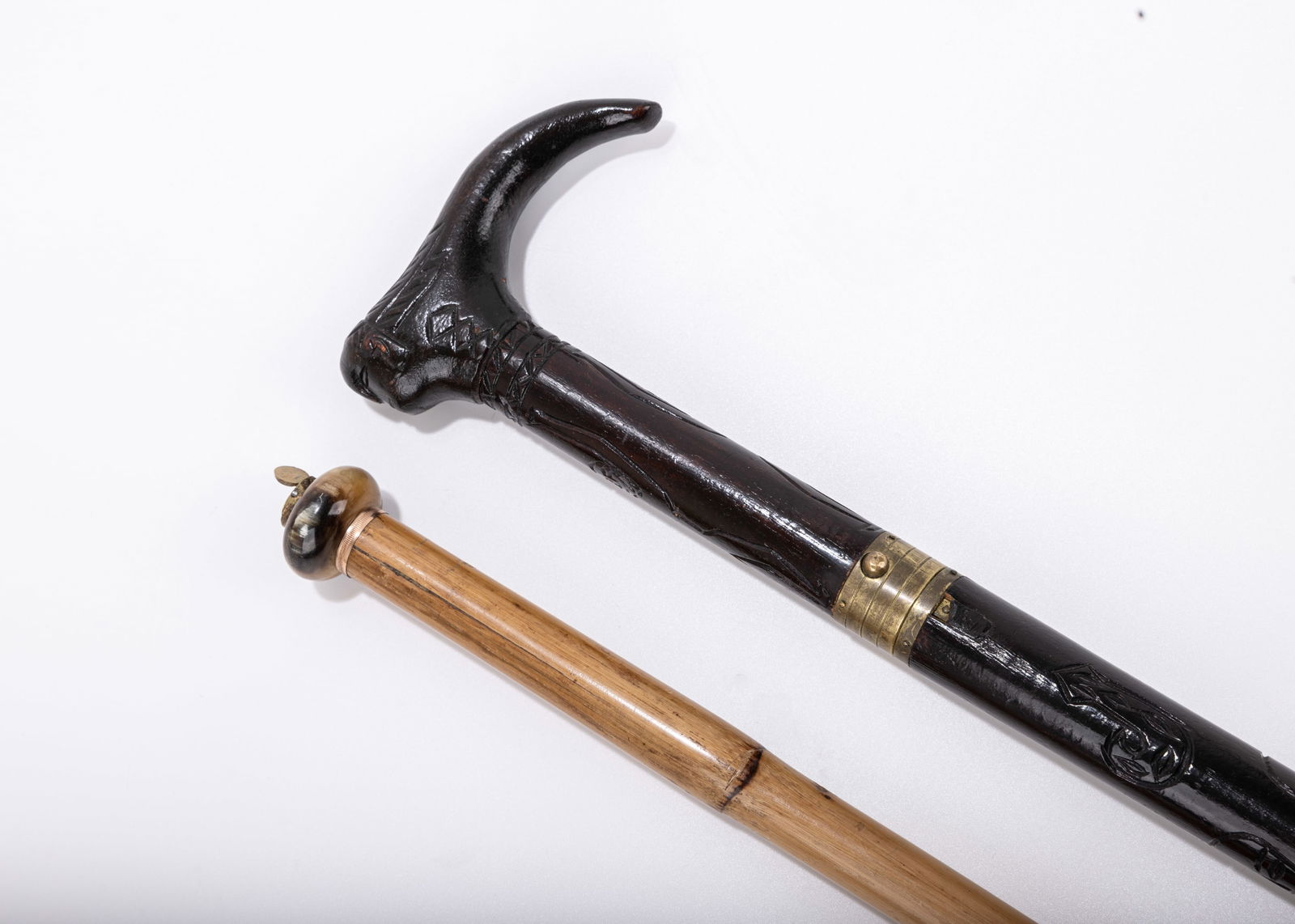 A GROUP OF TWO CANES WITH HIDDEN WEAPONS (1 of 5)