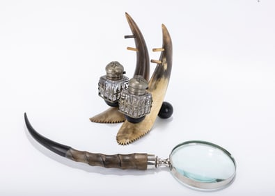 A HORN ARTS AND CRAFTS SALT AND PEPPER SET. American, c. 1920. Each horn&nbsp; (7.7â€?