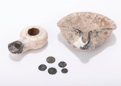 TWO HOLY LAND OIL LAMPS AND FIVE ROMAN ERA COPPER COINS. Israel.