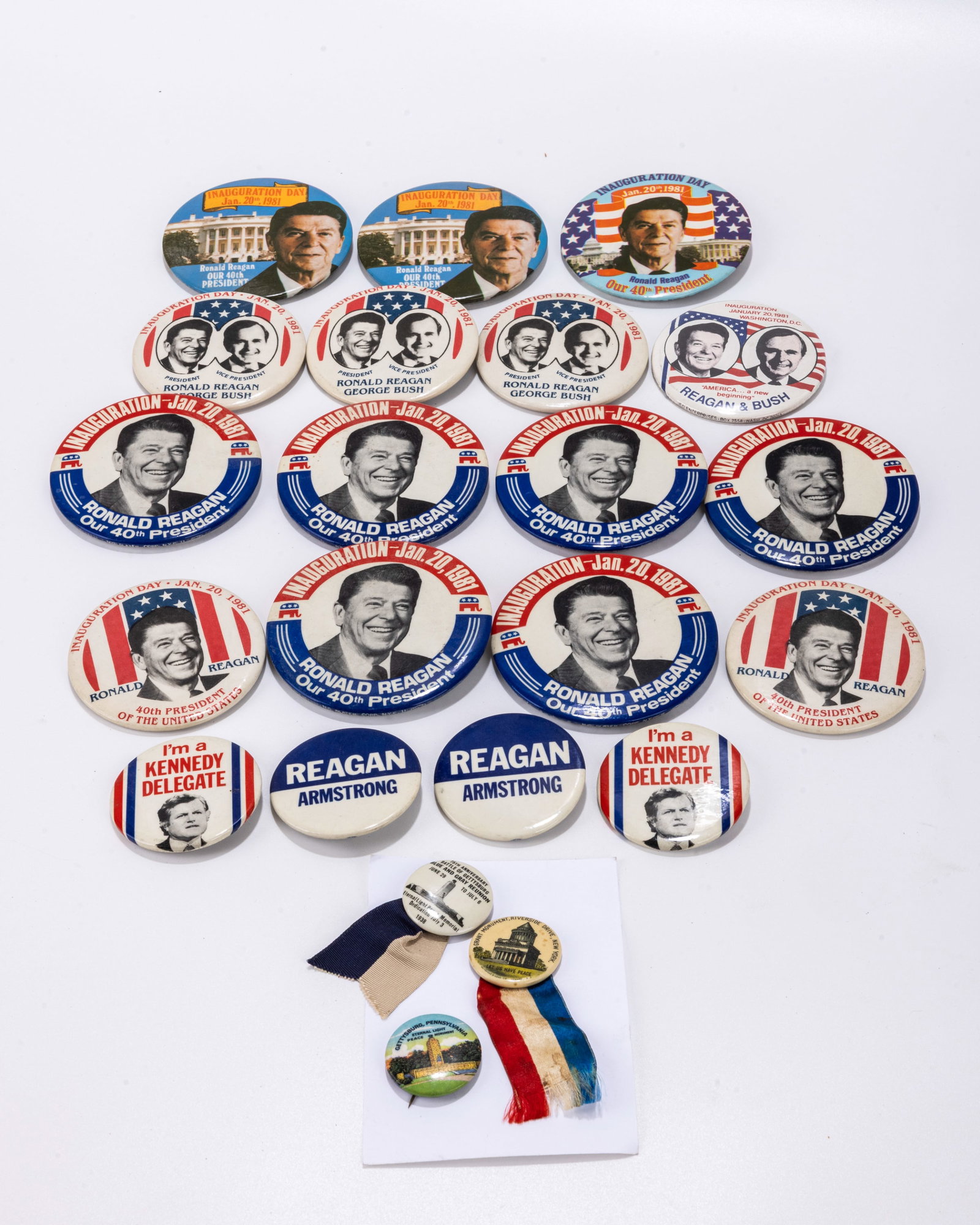 A COLLECTION OF RONALD REAGAN POLITICAL BUTTONS. C. 1980. Accompanied by other political buttons.: A COLLECTION OF RONALD REAGAN POLITICAL BUTTONS. C. 1980. Accompanied by other political buttons.