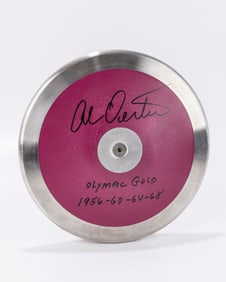 AN 2.0 KG UCS DISCUS SIGNED BY AL OERTER. Signed and inscribed in black sharpie Olympic Gold 1956,