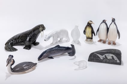 A GROUP OF PORCELAIN AND FIGURINES. Including penguins, fishbirds and a polar bear. Makers include