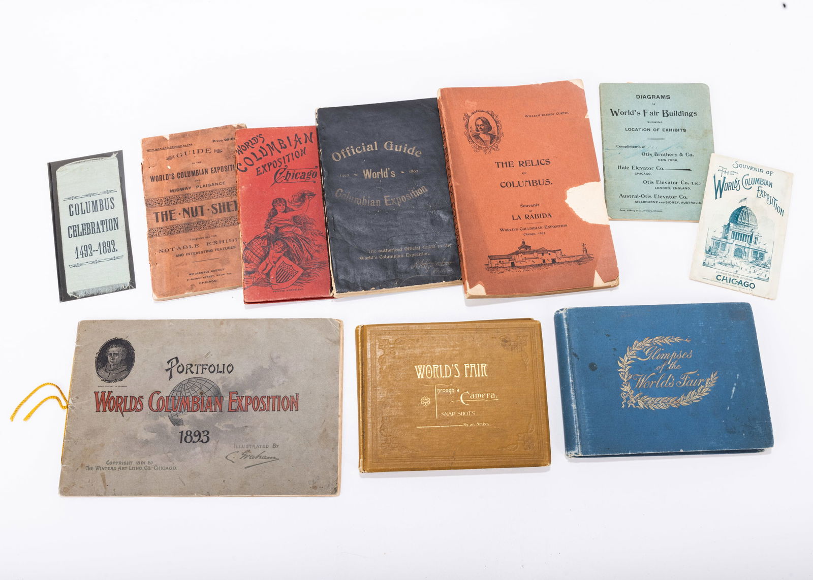A GROUP OF WORLDS FAIR/COLUMBIAN EXPOSITION 1893 AND OTHERS. Including Diagrams of the: A GROUP OF WORLDS FAIR/COLUMBIAN EXPOSITION 1893 AND OTHERS. Including Diagrams of the World's Fair Buildings showing the Location of Exhibits, The Relics of Columbus, Worlds Fair Through a Camera, Gl