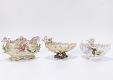 A GROUP OF MAJOLLICA AND PORECELAIN FIGURES. Including four figurines and three bowls One bowl with