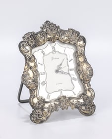 A STERLING SILVER GORHAM DESK CLOCK. American, c. 1940. With a sterling silver mounting. 5â€?