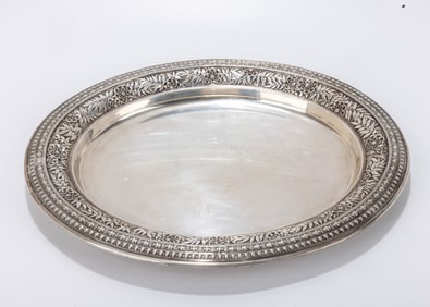 A LARGE OVAL TRAY BY TIFFANY AND COMPANY.