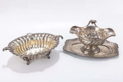 A MASSIVE FRENCH STERLING GRAVY BOAT AND AN ENGLISH FOOTED BOWL.
