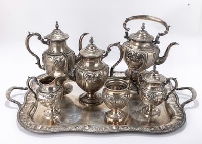 A MASSIVE STERLING SILVER TEA SET BY FRED HIRSCH COMPANY Jersey City, N.J. (1920 - 1945).