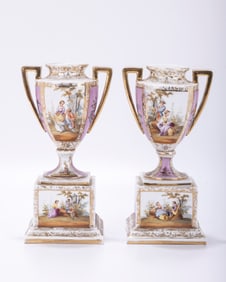 A PAIR OF PORCELAIN VASES. Continental, early 20th century. Hand painted with classical royal