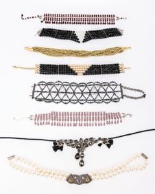 A GROUP OF STERLING SILVER JEWELRY. Including two bracelets, five brooches and a heart necklace.