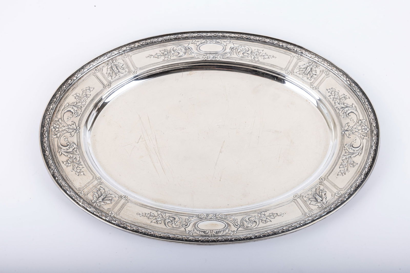 A LARGE STERLING SILVER OVAL PLATTER BY GORHAM SILVER. American, c. 1940. Good condition with light (1 of 4)