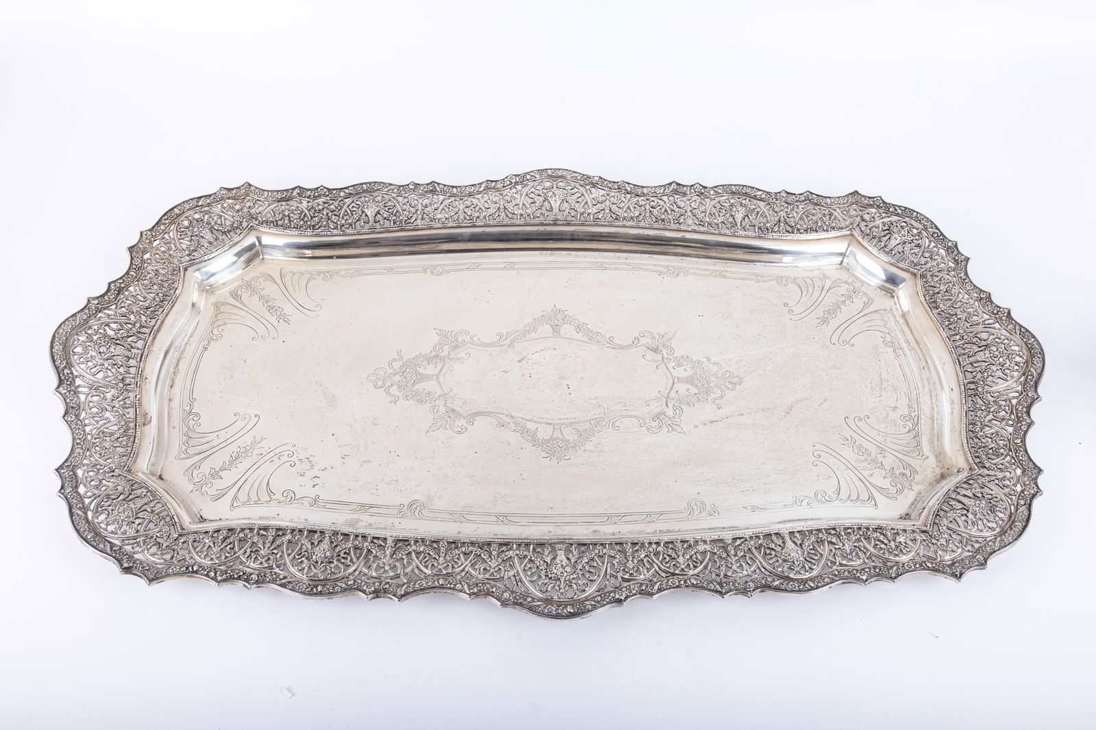 A MONUMENTAL STERLING SILVER LOUIS XVI STERLING TRAY BY SHREVE AND COMPANY. American, c. 1930. With (1 of 11)