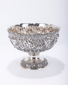 A LARGE STERLING SILVER REPOUSEE CENTERPIECE BOWL. Hand chased with floral and organic decoration.