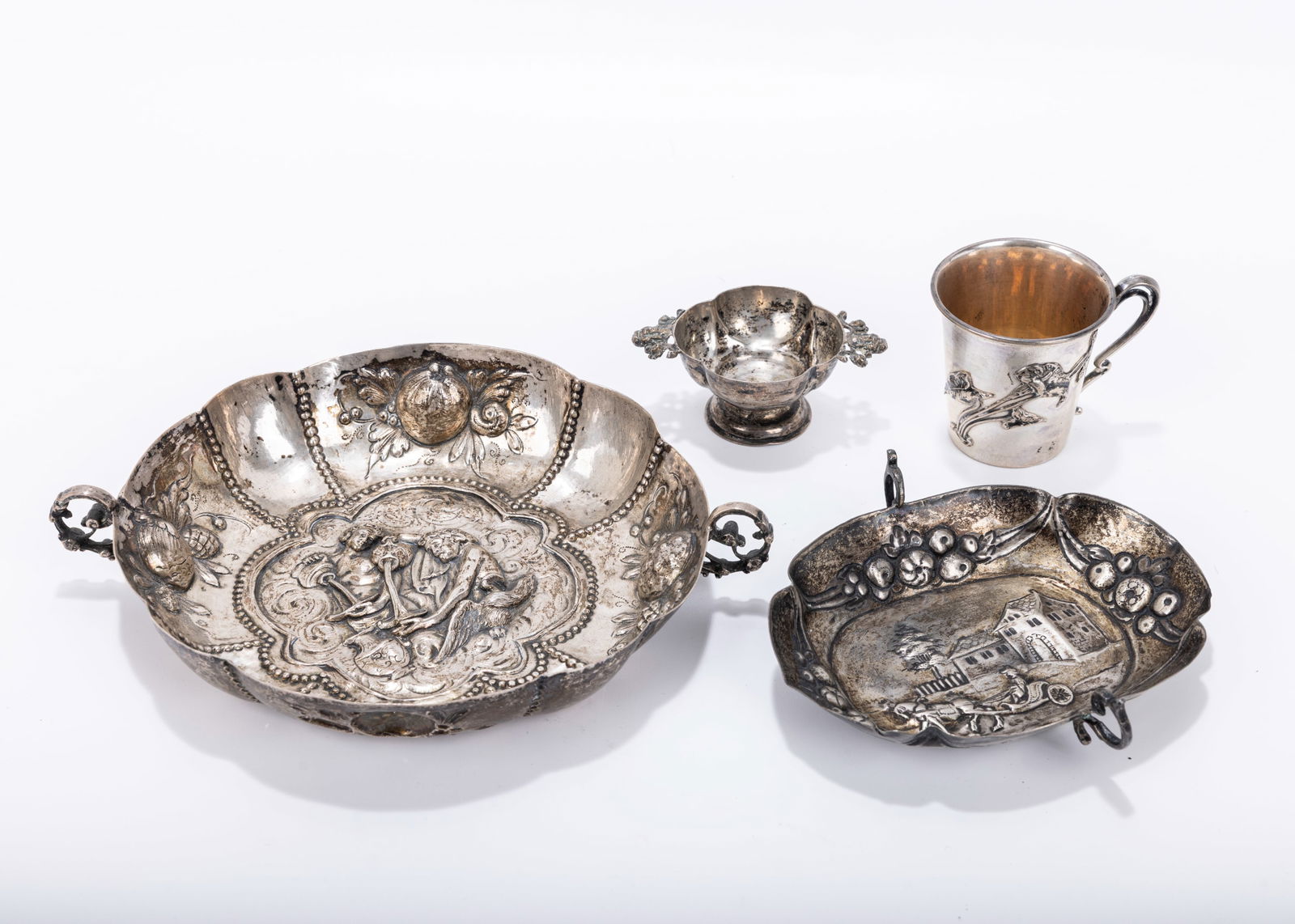 A GROUP OF FOUR VERY OLD GERMAN 800 SILVER TABLE WARE. Including a small cup and three dishes. 8.19 (1 of 1)