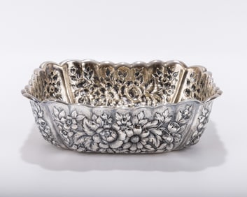 A STERLING SILVER SQUARE BOWL BY THEODORE STARR. American, c. 1900. Repousee. Decorated with floral