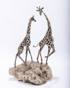 A LARGE SILVER SCULPTURE OF GIRAFFES BY HENRY MITCHELL Philadelphia, 20th century. 19" tall.