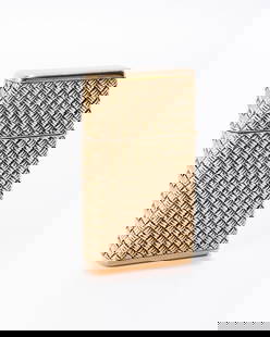 AN 18K GOLD LIGHTER BY BOUCHERON. Paris, c. 1940. Weaved style .29.3 grams without mechanism (Just: AN 18K GOLD LIGHTER BY BOUCHERON. Paris, c. 1940. Weaved style .29.3 grams without mechanism (Just the gold part). 2.1" x 1.1". Signed Boucheron, Paris, 18K gold minerva head and serial number.