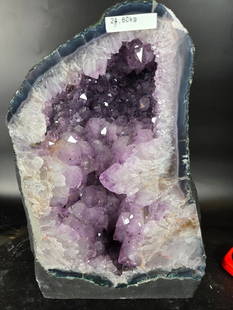 AMETHYST CATHEDRAL GEODE WITH POLISHED EDGES: 15.5" TALL AND 9.5" AT IT'S WIDEST, 24.6 KILOGRAMS