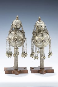 A PAIR OF PARCEL GILT TORAH FINIALS. Yemen, 19th century.
