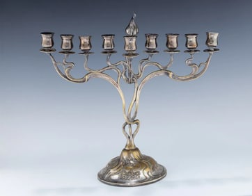 A RARE AND IMPORTANT ART NOUVEAU MENORAH. Germany, c. 1910. Possibly by WMF.