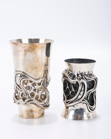 TWO STERLING SILVER KIDDUSH CUPS BY MICHAEL GALMER FOR SACHS JEWELERS. American, c. 1980. Chased