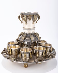 A LARGE WINE FOUNTAIN. Israel, modern. Silver plated on brass. With one large cup and eight smaller