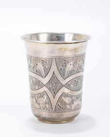 A SILVER BEAKER. Russia, 1873. Bright cut engraving. 2.5: tall. 1.28 ozt.