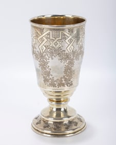 A MONUMENTAL SILVER GOBLET. Russia, 1880. ON a round foot with magnificent bright cut designs. In