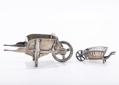 TWO SILVER WHEEL BARROW CONTAINERS. Germany, c. 1900.