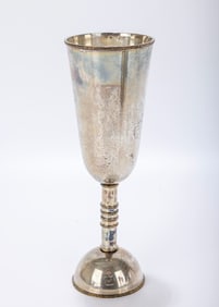 A STERLING SILVER KIDDUSH GOBLET BY MICHAEL ENDE. Jerusalem, c. 1980. On a domed base. The upper