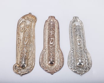 A GROUP OF THREE STERLING SILVER MEZUZAH CASES BY MICHAEL ENDE. Jerusalem, c. 1980. Each one hand