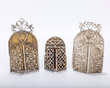 A GROUP OF THREE STERLING SILVERÂ  AND BRASS MEZUZAH CASES BY MICHAEL ENDE. Jerusalem, c. 1980.