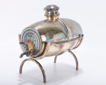 A SILVER PLATED WINE BARREL. Israel, c. 1960. In barrel form with a fountain. Embossed with a