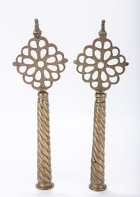 A PAIR OF BRASS TORAH FINIALS. Morocco, c. 1880. The staves with twist designs and fitted with key