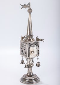 A SILVER SPICE TOWER. Warsaw, 1887. On a round base with a square filigree section. Fitted with four