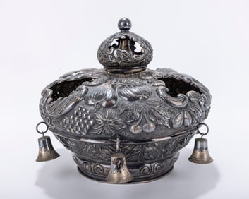 A SILVER TORAH CROWN. Hungarian, 20th century. Chased with fruits, scrolls and other organic