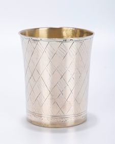 AN EARLY SILVER KIDDUSH CUP. Poland, 1844. Diamond shaped engravings on the body. With the former