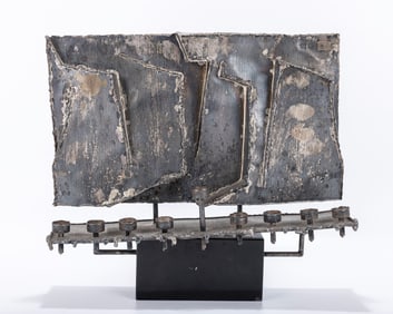 A LARGE STERLING SILVER MENORAH BY GEORGES WEIL. London, c. 1990. Abstractly forming the word
