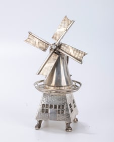 A SILVER WINDMILL SPICE BOX. Dutch, c. 1900. The main body is engraved with brick design. The
