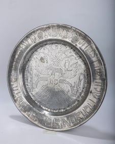 AN EARLY PEWTER SEDER TRAY. Germany, c.1780. Engraved with a double headed eagle, a sacrificial