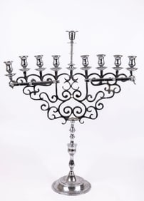 A LARGE CHROME PLATED MENORAH. Poland or the United States, c. 1900.
