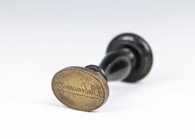 AN EARLY WAX SEAL. Continental, c. 1800. Engraved with an illegible name. 1” wide.