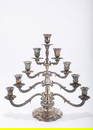 A STERLING SILVER MENORAH BY BUCCELATI. Italy, c. 1990. On a stylized circular base with classical